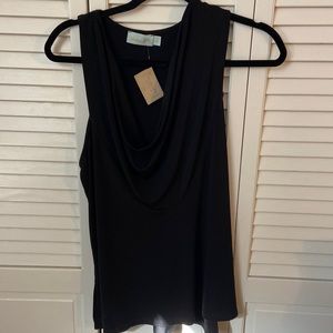 Boutique sleeveless blouse. NEW WITH TAGS